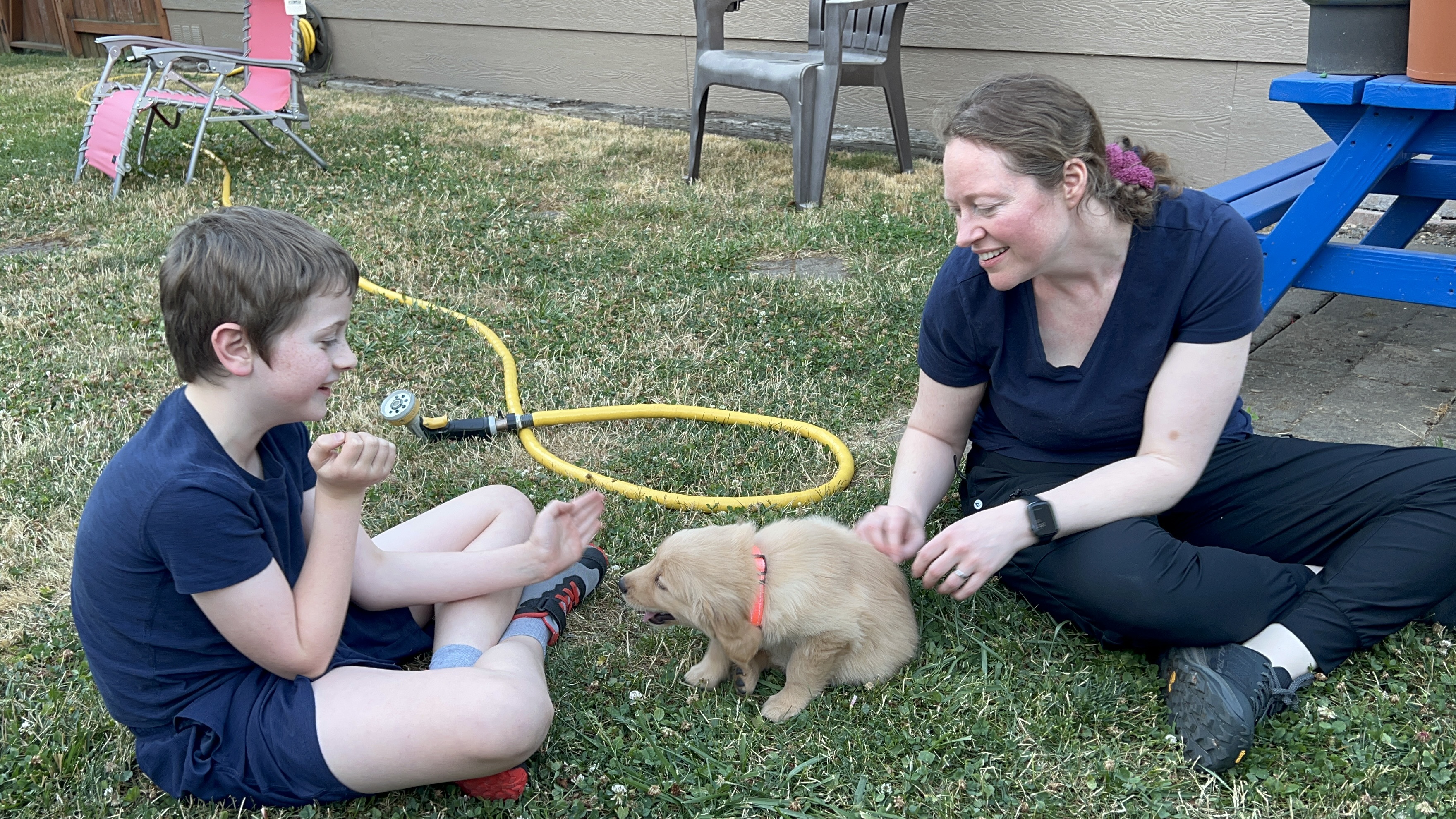 Cordelia in the yard with her family